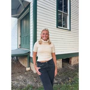 NEW DESIGN HISTORY mimi turtle neck top in sand